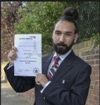 Man bun hairstyle 'gets British Airways worker the sack'.JPG